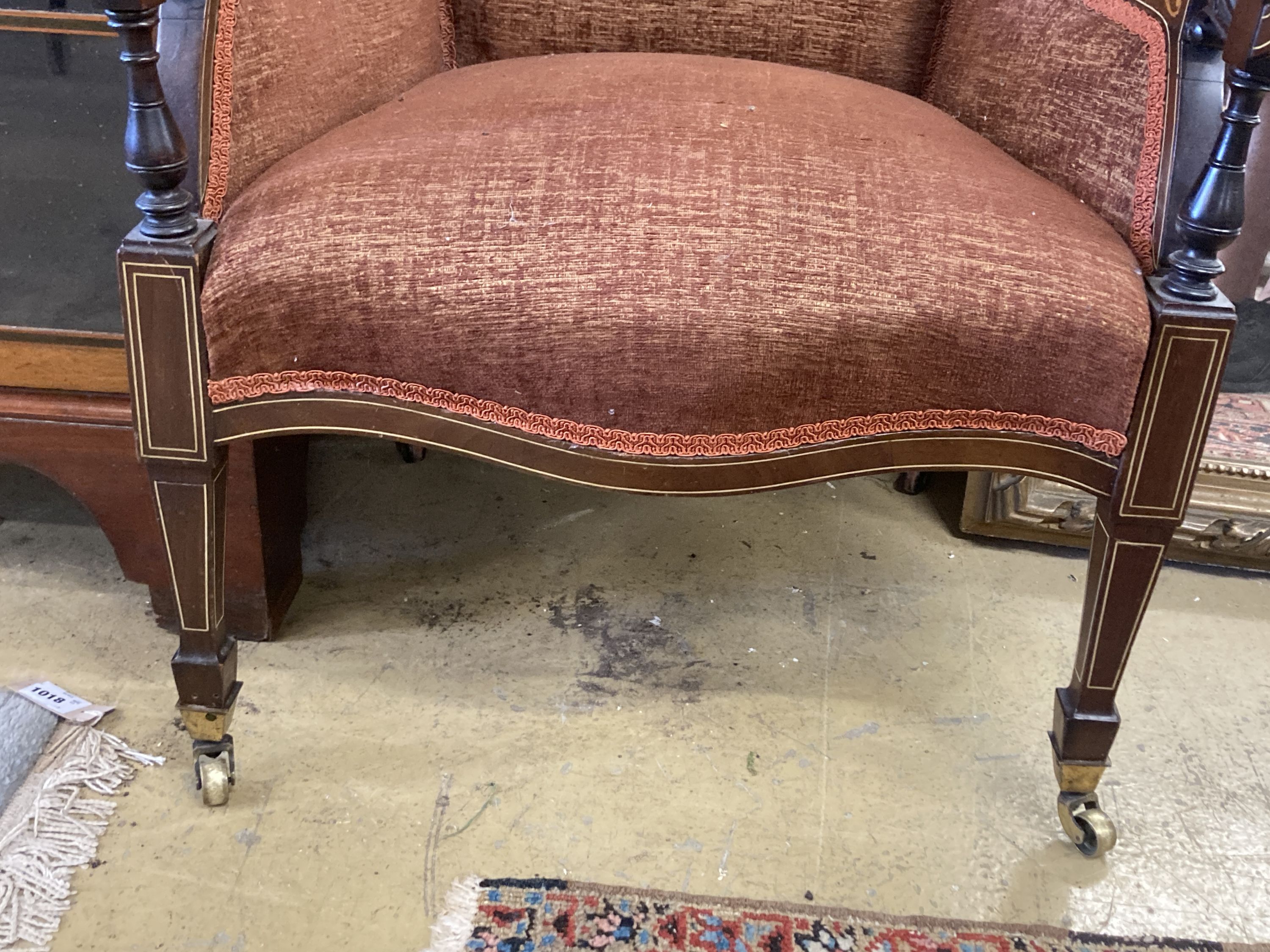 A late Victorian marquetry inlaid rosewood armchair, width 62cm, depth 70cm, height 78cm